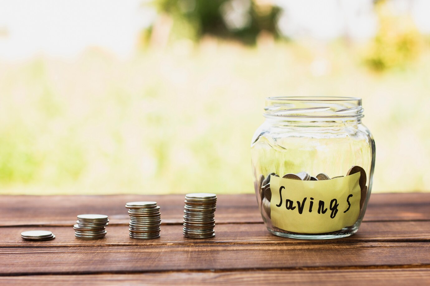 A savings jar with coins inside